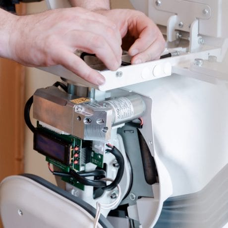 Engineer working on Stairlift