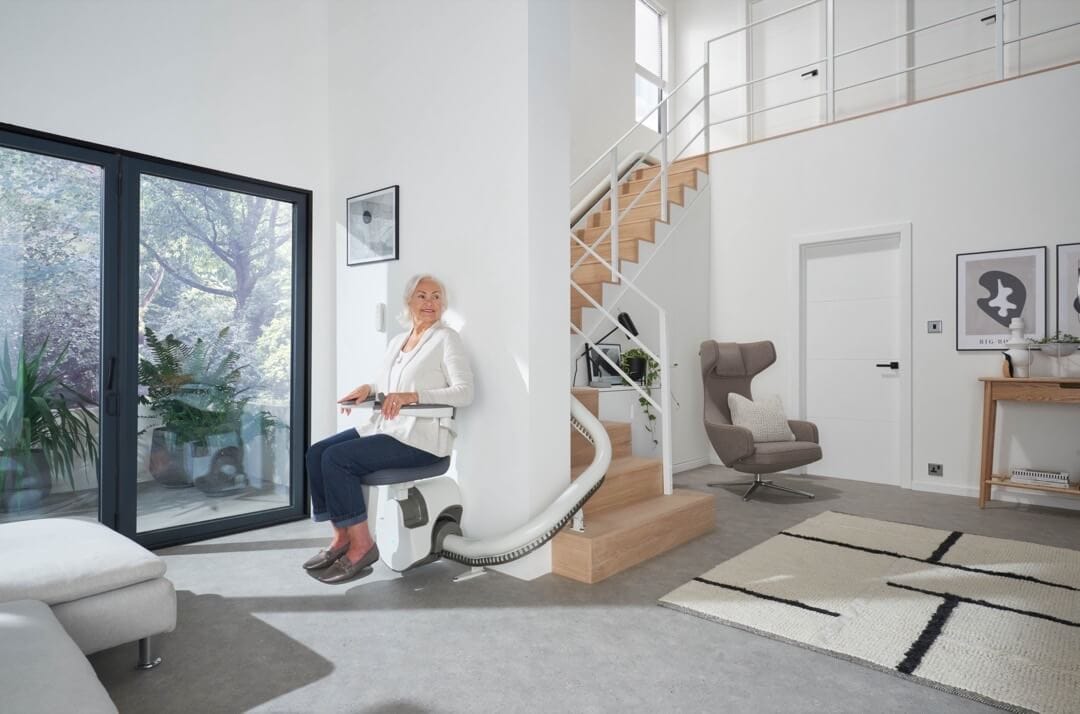 Flow X Stairlift ready to go upstairs with user